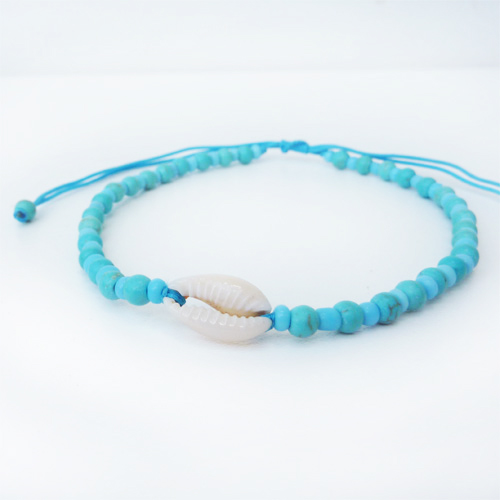 bracelet de cheville bleu turquoise en perles avec coquillage cauris artisanat de Bali
